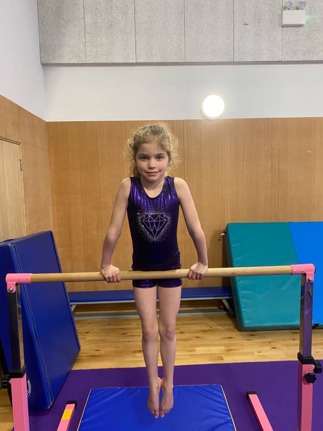 child wearing the girls leotard